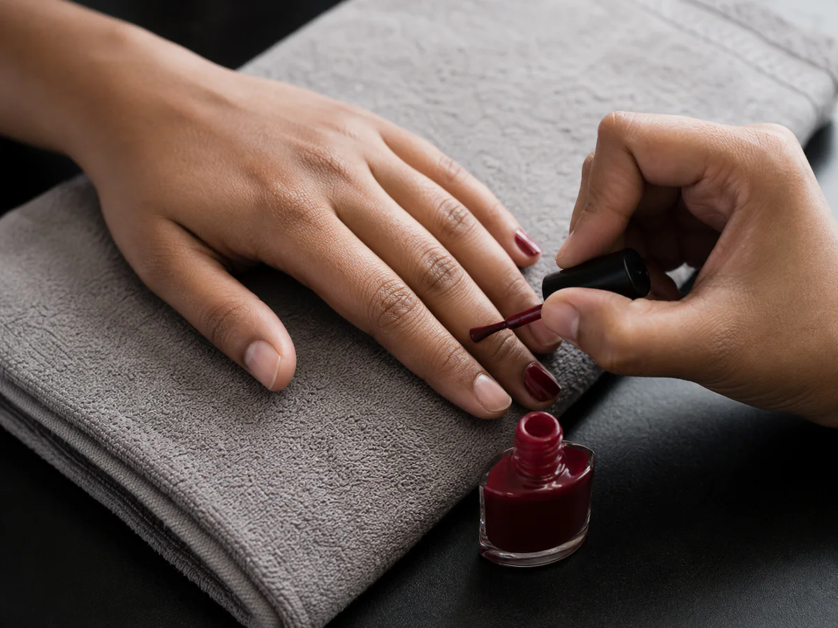 Editorial close-up of a professional manicure service.